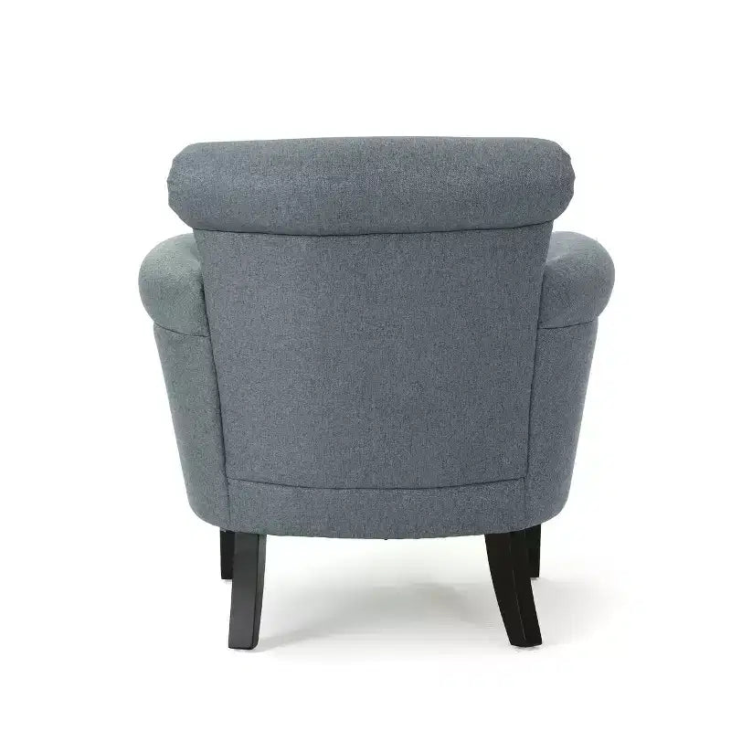 Fauteuil club contemporain en tissu avec garniture cloutée