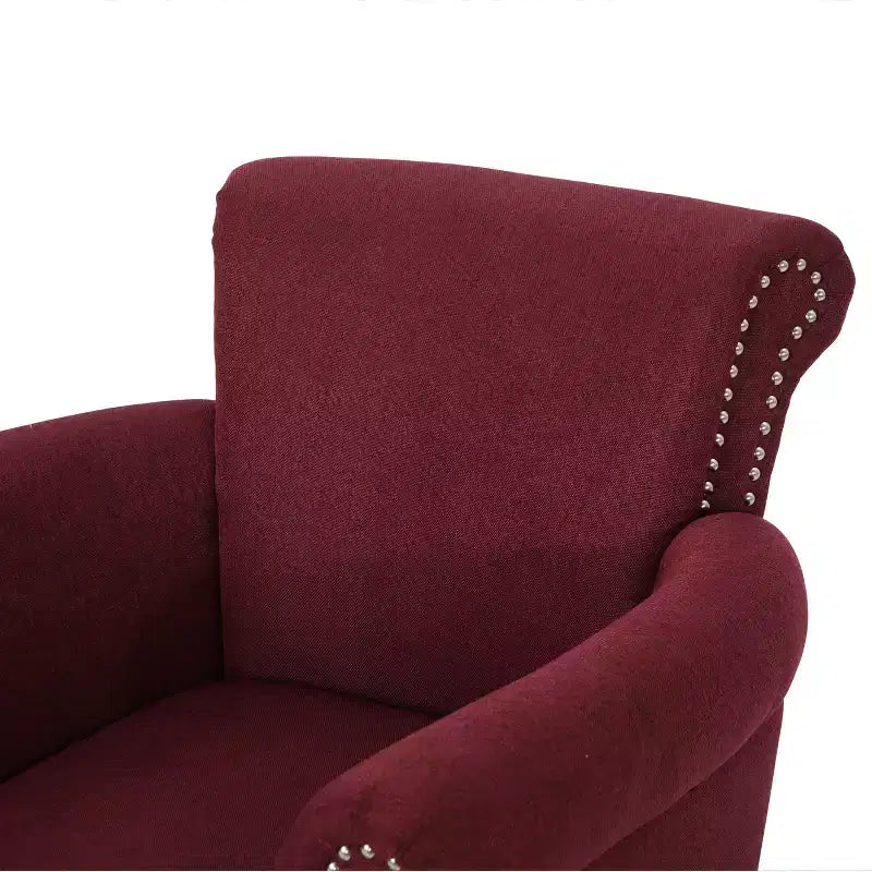 Fauteuil club contemporain en tissu avec garniture cloutée