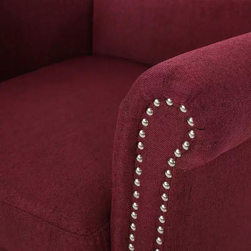 Fauteuil club contemporain en tissu avec garniture cloutée