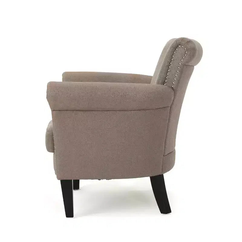 Fauteuil club contemporain en tissu avec garniture cloutée