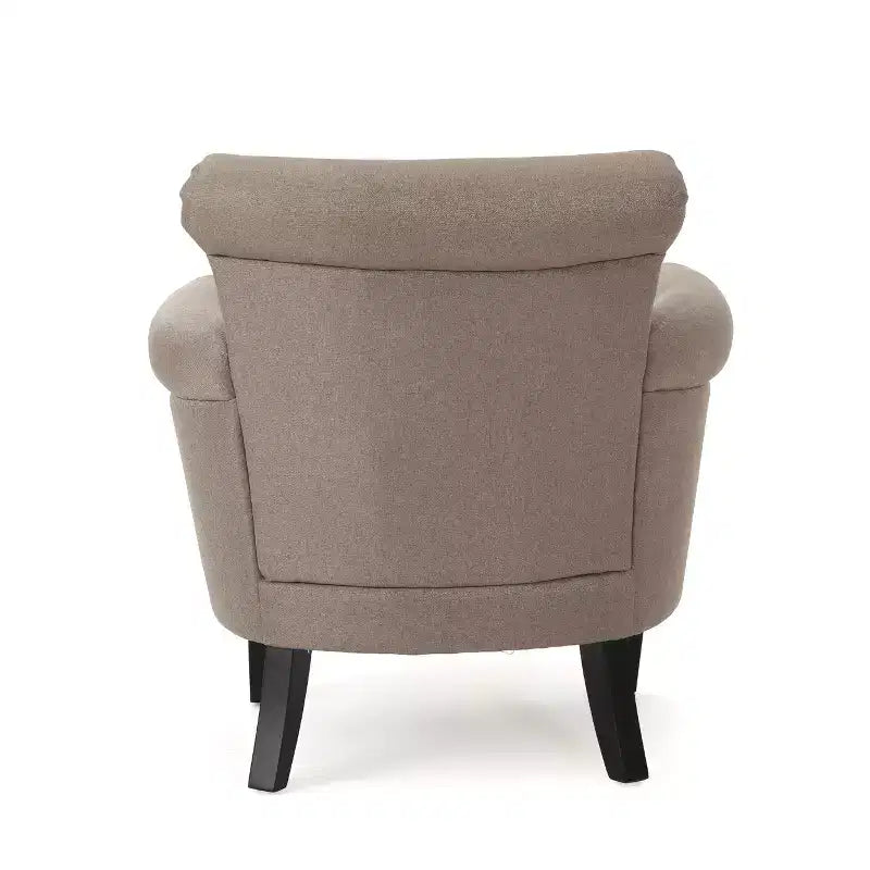 Fauteuil club contemporain en tissu avec garniture cloutée