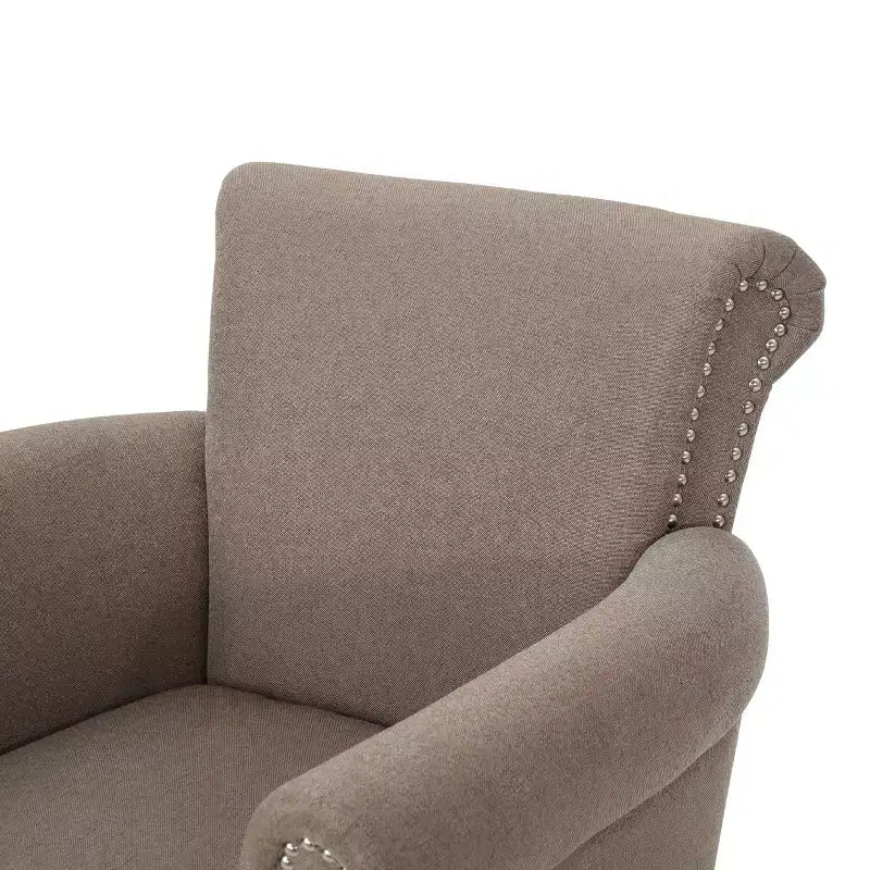 Fauteuil club contemporain en tissu avec garniture cloutée