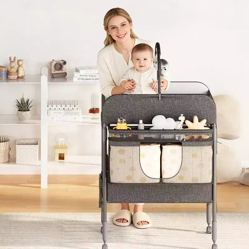 Table à langer pliable avec roulettes, station à langer à hauteur réglable avec 2 tiroirs, organisateur de chambre d'enfant mobile et étanche pour nouveau-nés