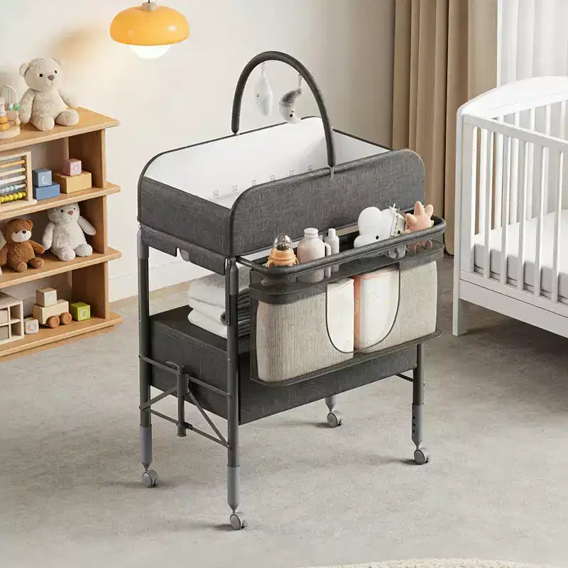 Table à langer pliable avec roulettes, station à langer à hauteur réglable avec 2 tiroirs, organisateur de chambre d'enfant mobile et étanche pour nouveau-nés